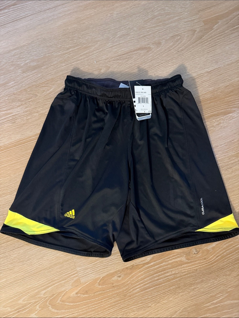 New adidas F50 Black Athletic Shorts with Yellow Trim